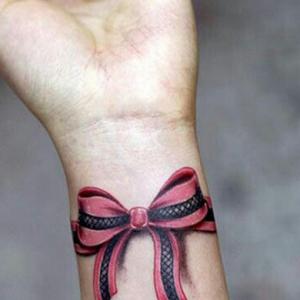Tatuaj cu fundă.  Semnificația unui tatuaj cu arc.  Schițe și fotografii cu tatuaje cu arc.  Tatuaj